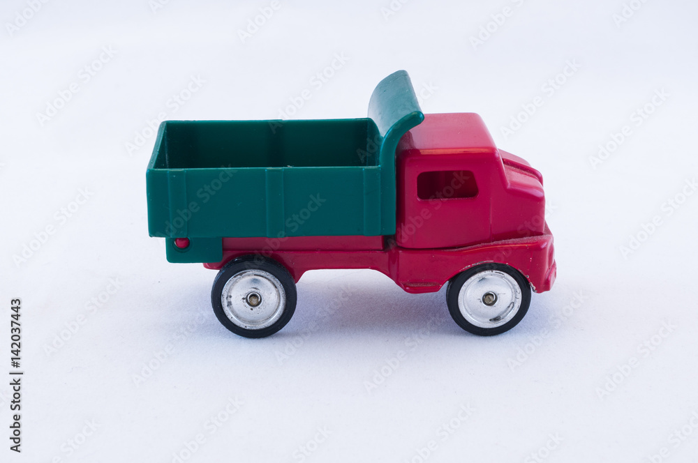 Vintage toy dump truck isolated on white background Stock Photo | Adobe