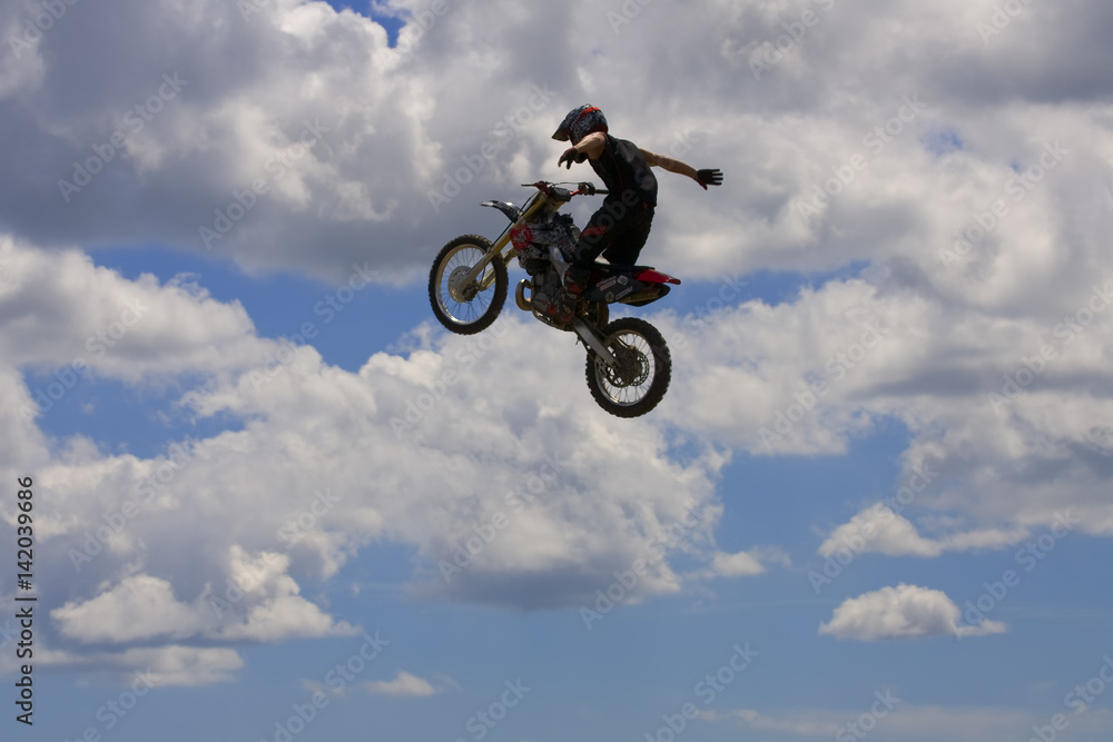 Stunt Biker. Free stile performing Stunt Biker. Free stile performing
