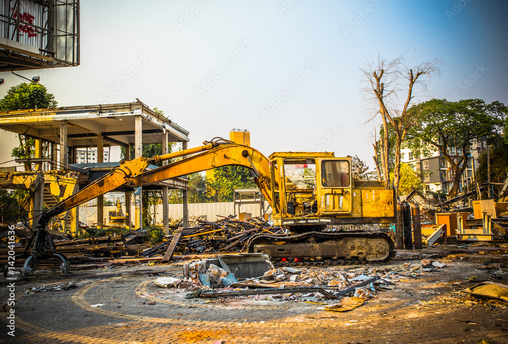 Old backhoe loaders that are heavily used in construction sites