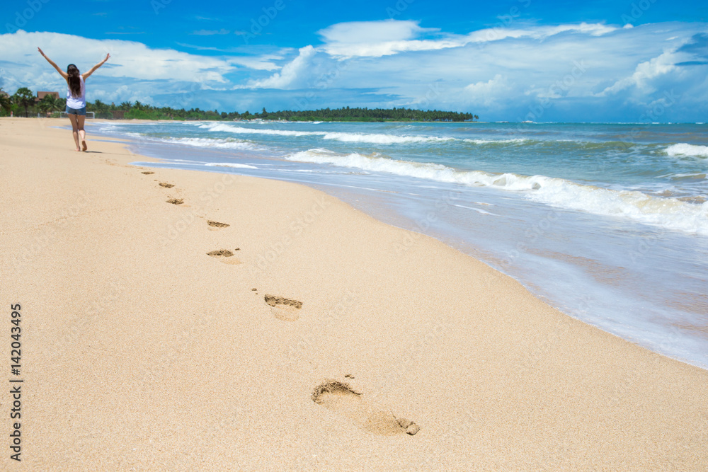 woman relaxes on beach