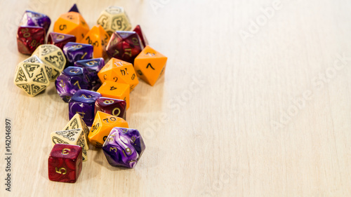Colorful roleplaying dice scattered on a table