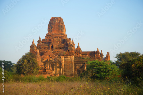 Ancient Buddhist pagoda Tha Kya Pone in the light of the morning sun. Bagan  Myanmar