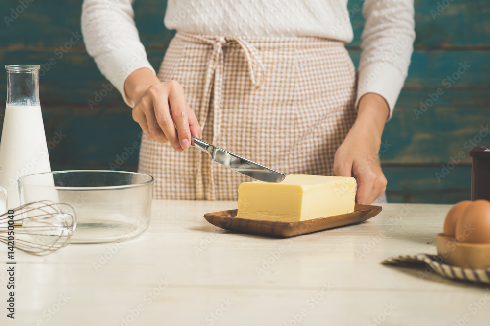 House wife wearing apron making. Steps of making cooking chocolate cake. House wife wearing apron making. Steps of making cooking chocolate cake.
