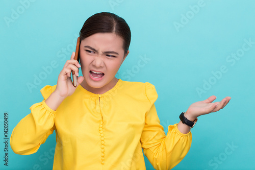 Photos Woman calling the smartphone and she feel angry