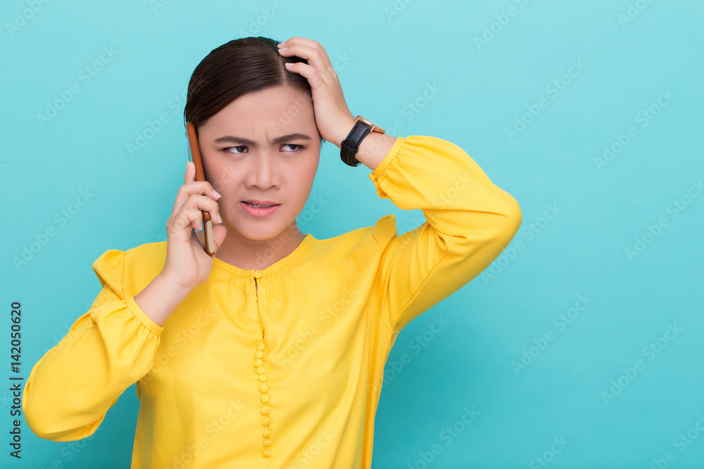 Woman calling the smartphone and she feel angry Woman calling the smartphone and she feel angry