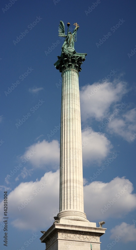 Detail of Millenium Monument with archangel Gabriel on the top, located on the Heroes` Sqaure in Budapest