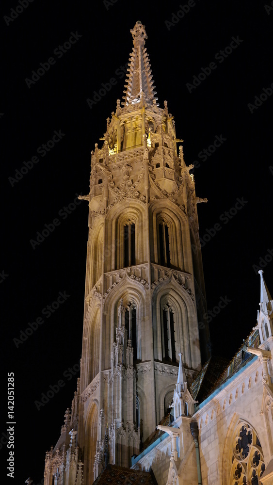 Bottom view of Matthias Church tower, night scene, Budapest