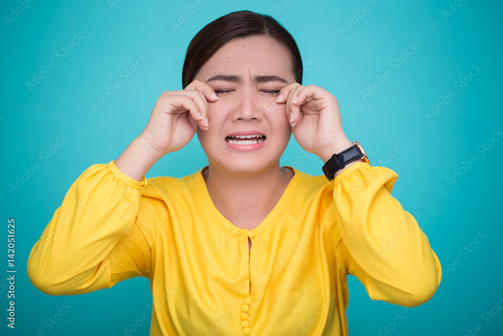 Crying woman on isolated background Crying woman on isolated background