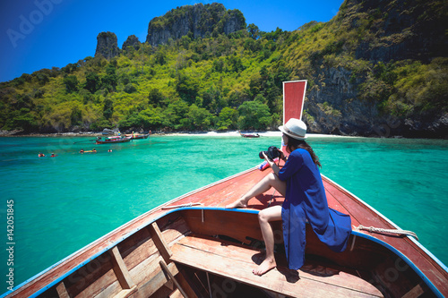 Obraz na płótnie Happy female traveling on boat, Krabi Thailand w salonie