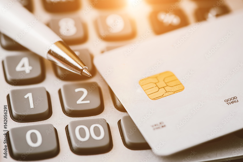 Low key macro shot with credit card. Low key macro shot with credit card.