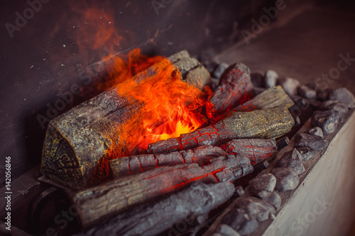 electric fireplace with artificial sparkling flame, decor for the interior