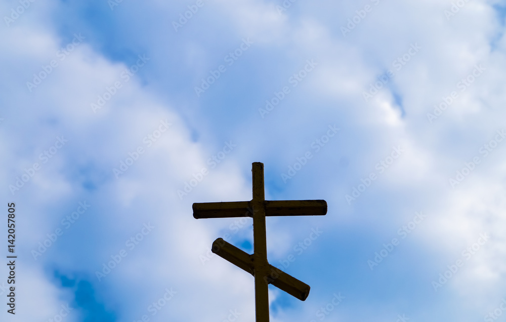 religion wooden cross against the blue sky religion wooden cross against the blue sky