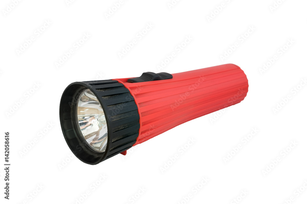 Red flashlight off laying on white background Red flashlight off laying on white background