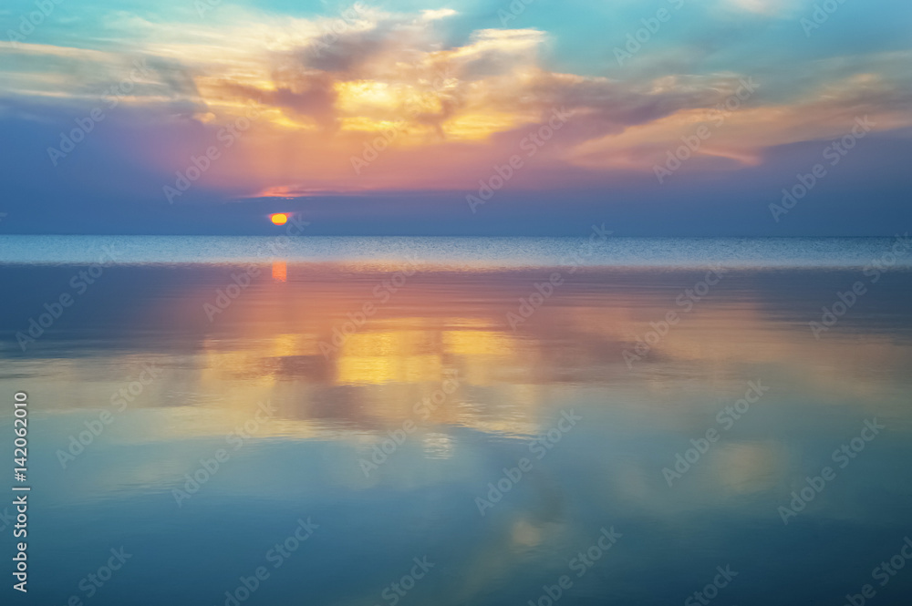 Sunset with reflection on the water
