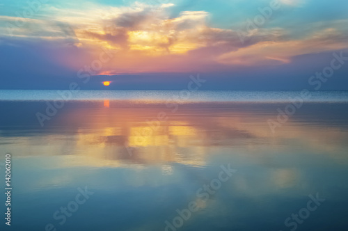 Sunset with reflection on the water