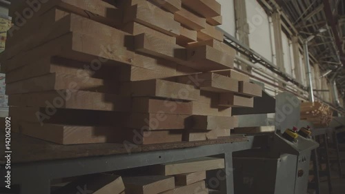 LVL Laminated Veneer Lumbe. Large hangar with the production line for wood. The interior of the production hall in the woodworking factory. Workshop for production of laminated veneer lumber. photo