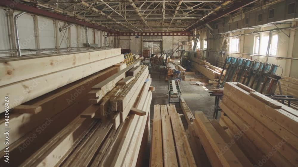 LVL Laminated Veneer Lumbe. Large hangar with the production line for wood. Wood Factory general plan: the production of laminated veneer lumber. The interior of the production hall in the woodworking LVL Laminated Veneer Lumbe. Large hangar with the production line for wood. Wood Factory general plan: the production of laminated veneer lumber. The interior of the production hall in the woodworking