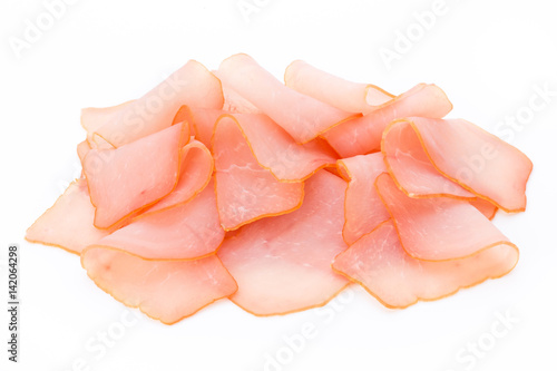 Sliced ham isolated on white background, top view.