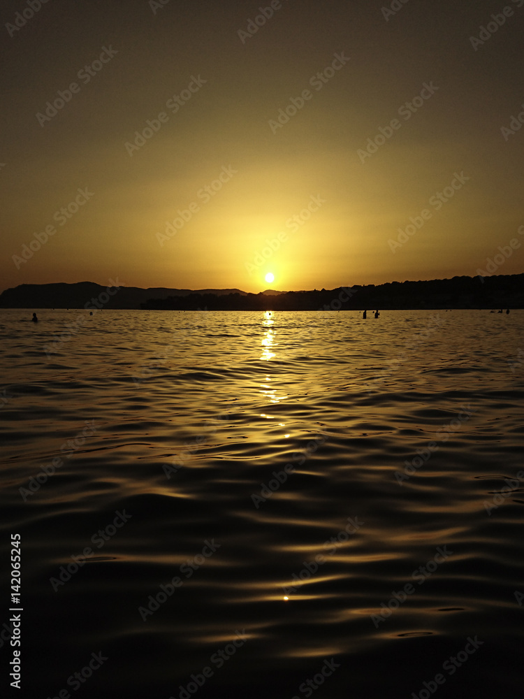 Naklejka premium sunset on the sea