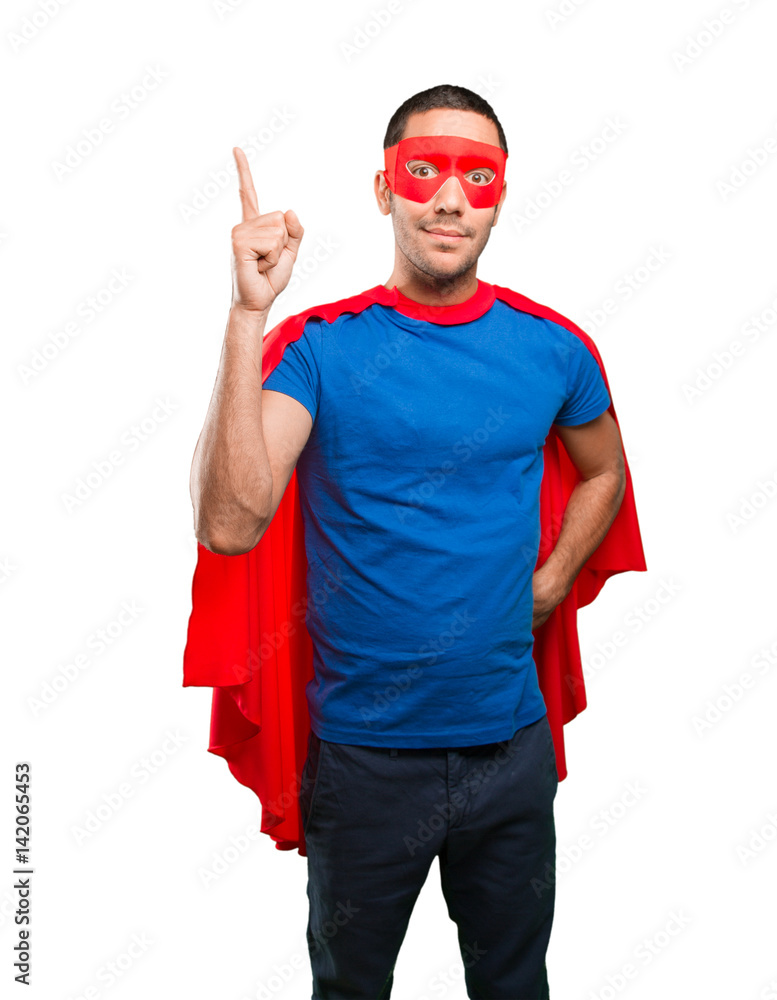 Surprised superhero pointing up Surprised superhero pointing up