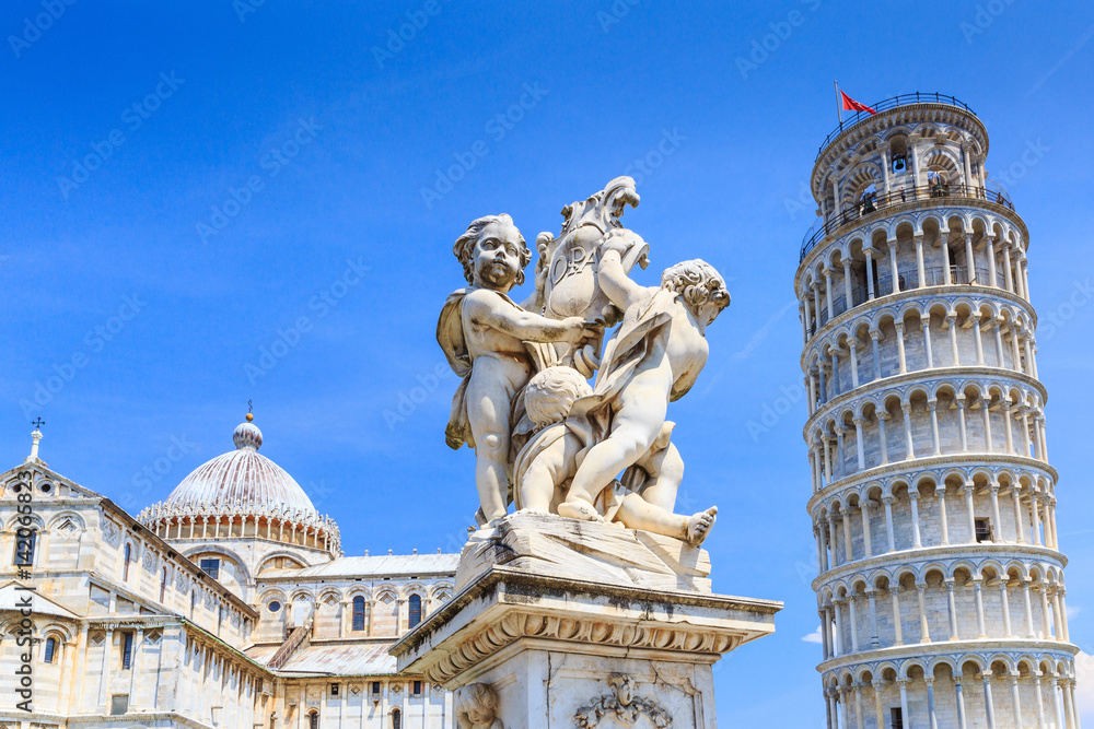Pisa, Italy. The fountain with angels, and the leaning tower of Pisa 
