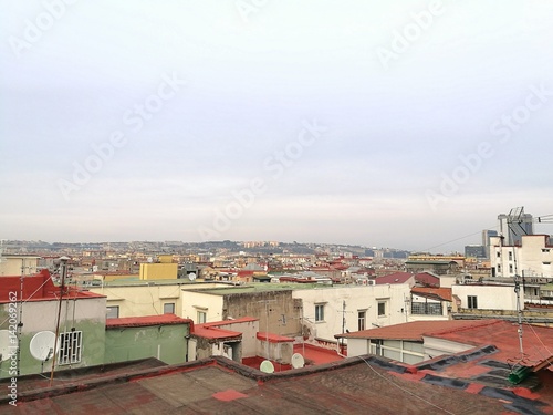 NAPLES, ITALY - JANUARY 28, 2017 : Rooftops view of Naples city on sunset