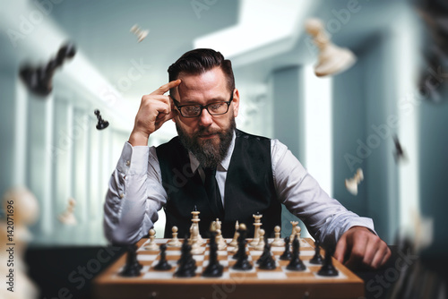 Chess player calculate movies and game strategy