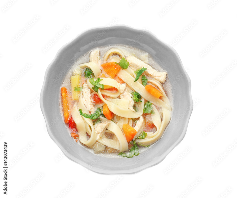 Chicken noodle soup in plate on white background Chicken noodle soup in plate on white background