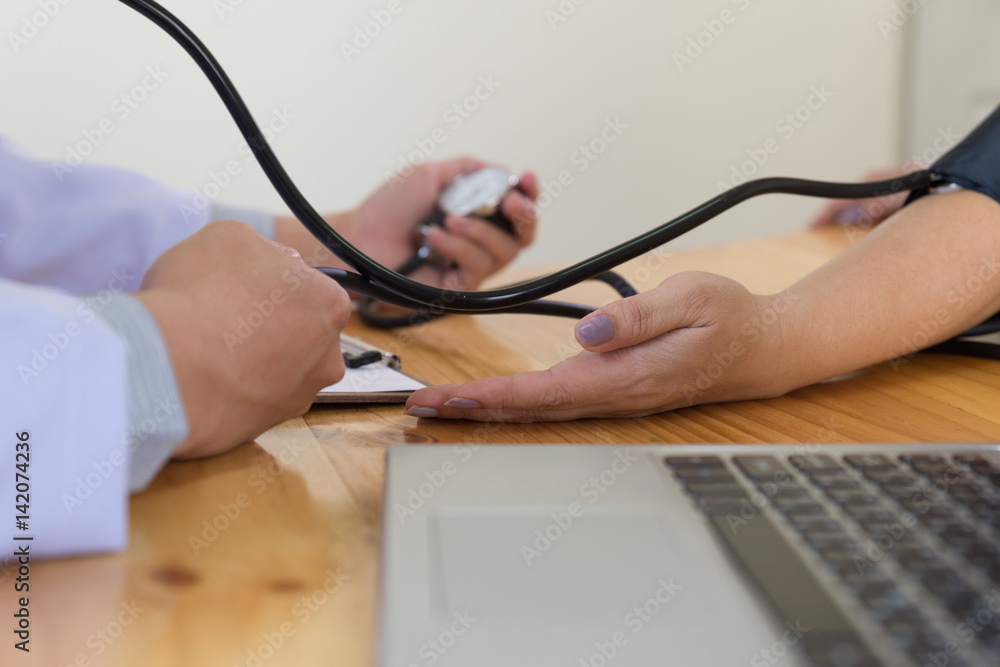 Φωτογραφία Blood pressure measuring. Doctor and patient. Health care.