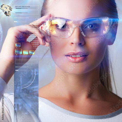 Woman in futuristic glasses photo