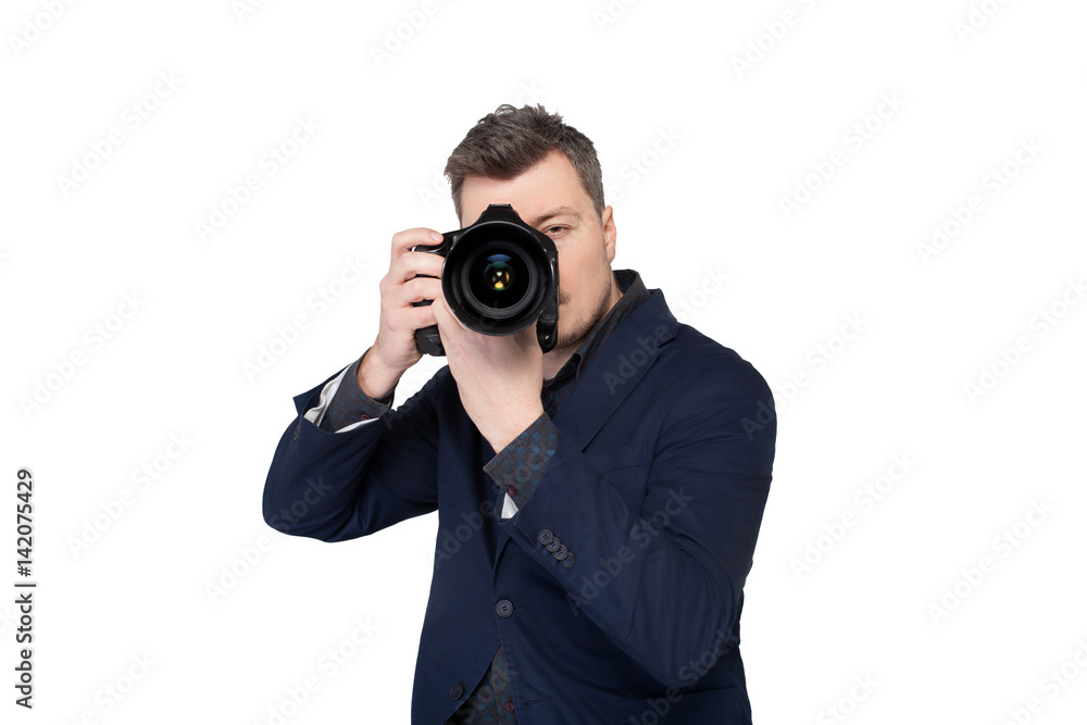Photographer with digital camera taking picture