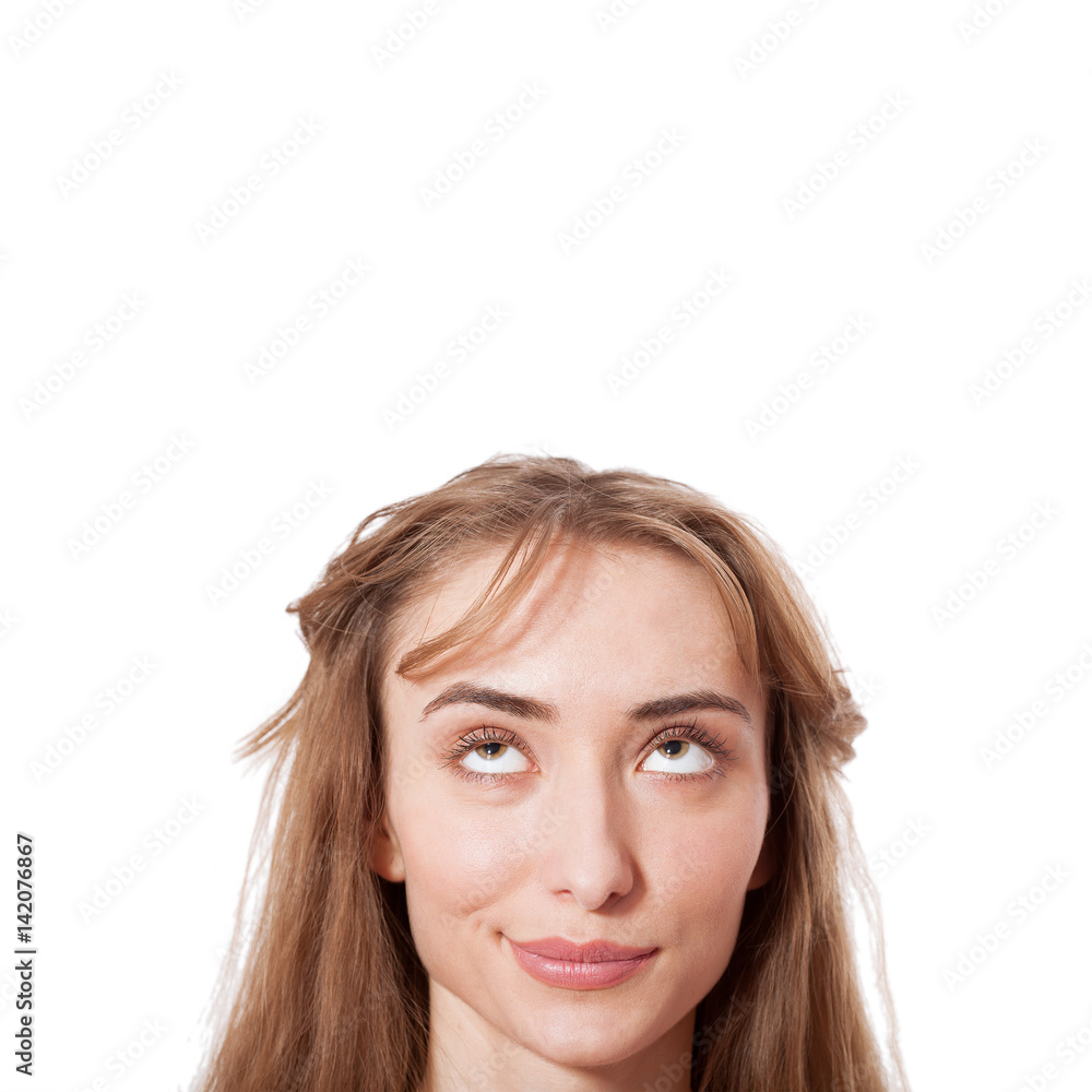 Look over there. Portrait of an attractive young blonde woman. Beautiful woman looking up thinking and dreaming isolated on white background Look over there. Portrait of an attractive young blonde woman. Beautiful woman looking up thinking and dreaming isolated on white background
