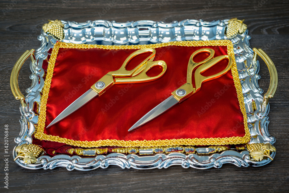 Golden scissors for the ceremonial ribboncutting at the opening