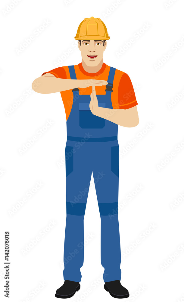 Builder showing time-out sign with hands Builder showing time-out sign with hands