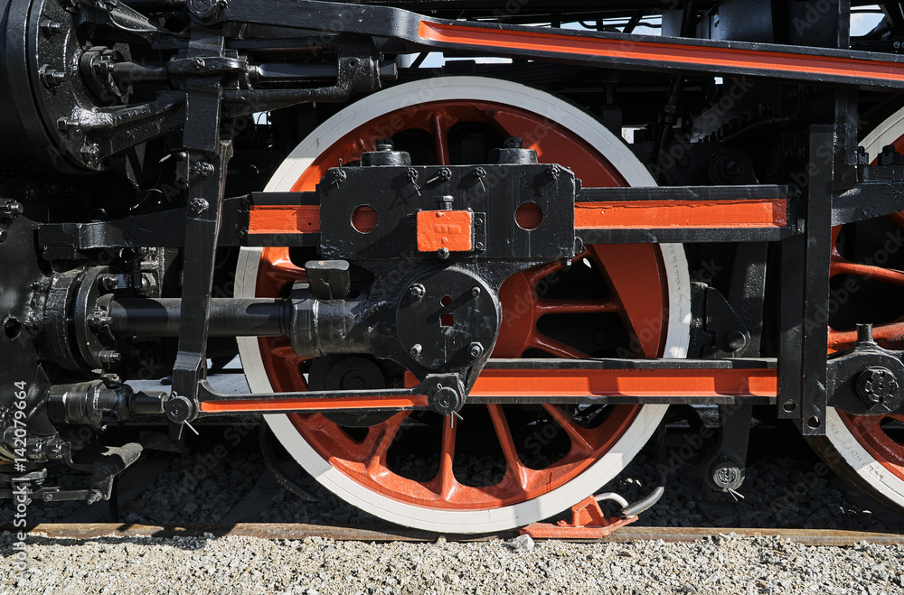 Pistons and driving wheel of the historic steam locomotive. Pistons and driving wheel of the historic steam locomotive.