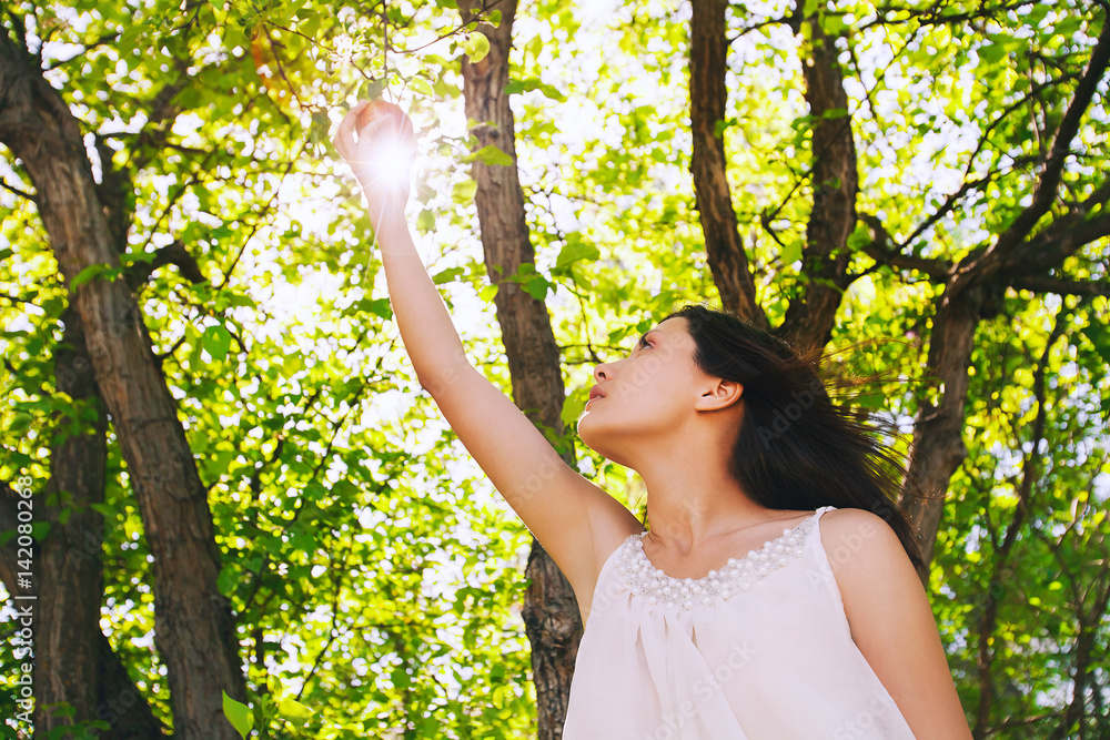 Summer girl on nature with fresh apple in hands. Summer girl on nature with fresh apple in hands.