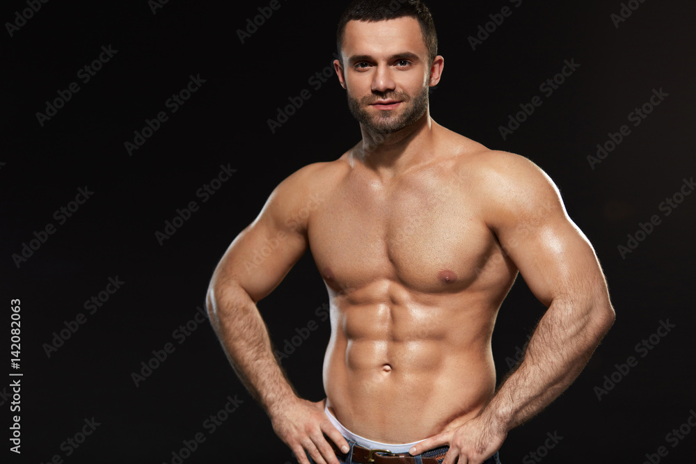 Portrait Of Sexy Young Man With Trained Hot Body. Bodybuilding