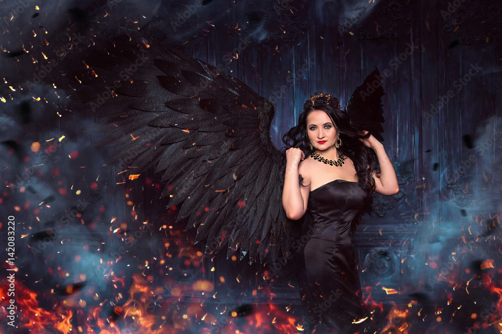 Beautiful girl with black wings spread. Dark Angel
