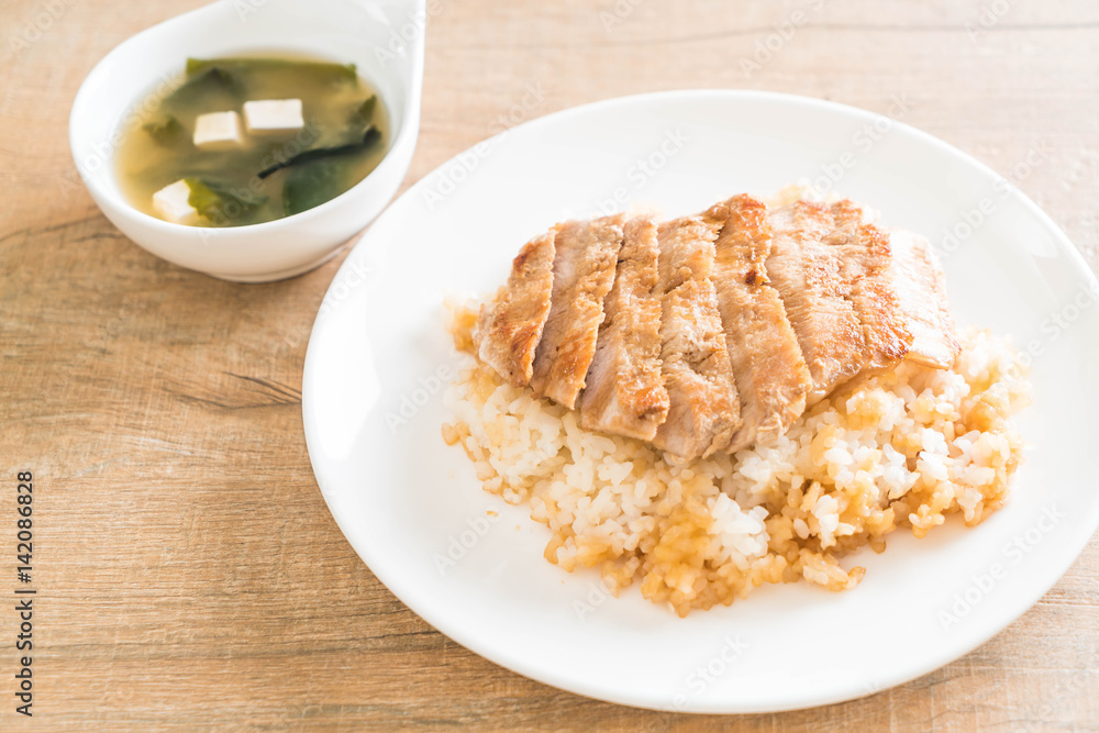 teriyaki pork on topped rice with miso soup teriyaki pork on topped rice with miso soup