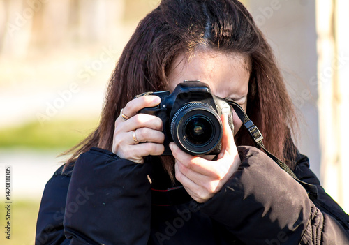 Girl in park with camera