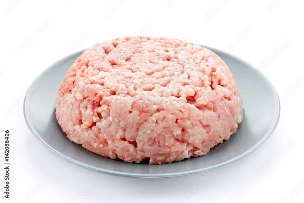 Chicken breast or rabbit low fat minced meat on plate Chicken breast or rabbit low fat minced meat on plate