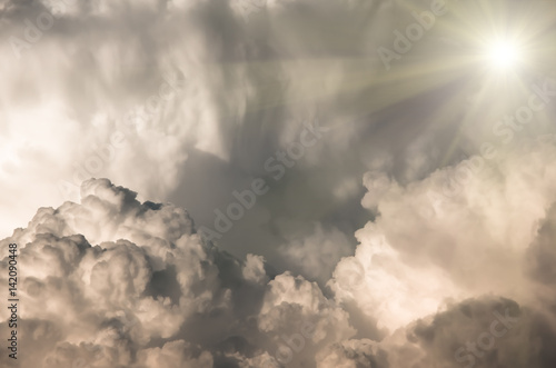 large clouds and sun before a storm, background