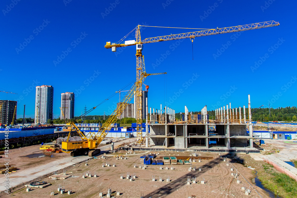 Cranes on the construction site. Building.