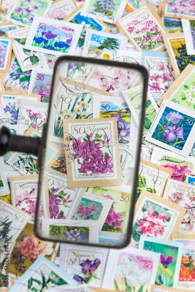 A stamp printed in Japan shows various flowers collection
