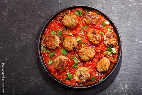 pan of meatballs with tomato sauce