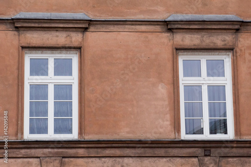 Two modern windows on the facade of the house