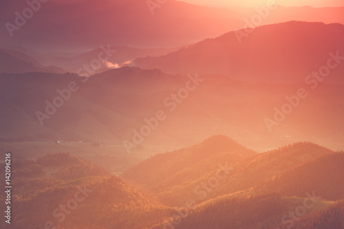 View of the top on fantastic sunlight of beautiful scenery mountain range at sunrise. Abstract nature concept.