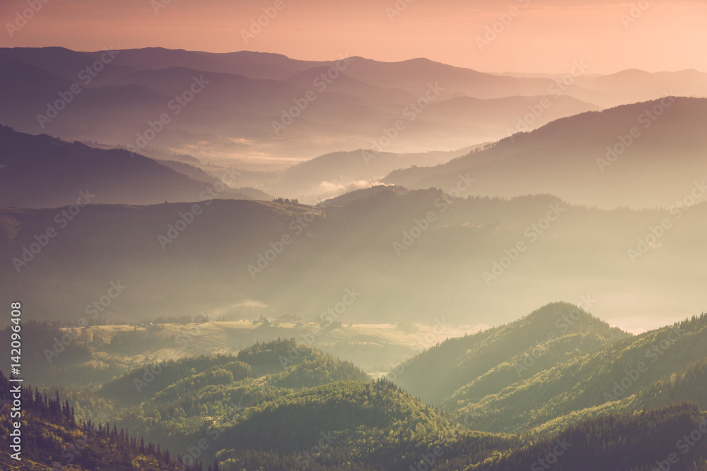 View of the top on fantastic sunlight of beautiful scenery mountain range at sunrise. Abstract nature concept.