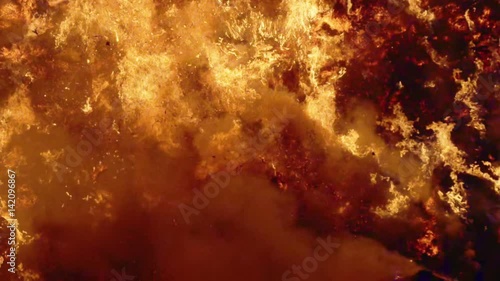 Fire storm, horrific fire destroys gigantic hay bales construction, Red Epic slow motion clip