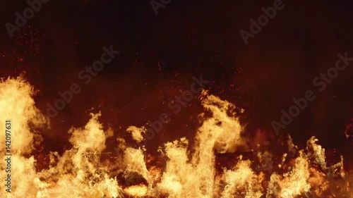 Fire storm, horrific fire destroys gigantic hay bales construction, Red Epic slow motion clip
